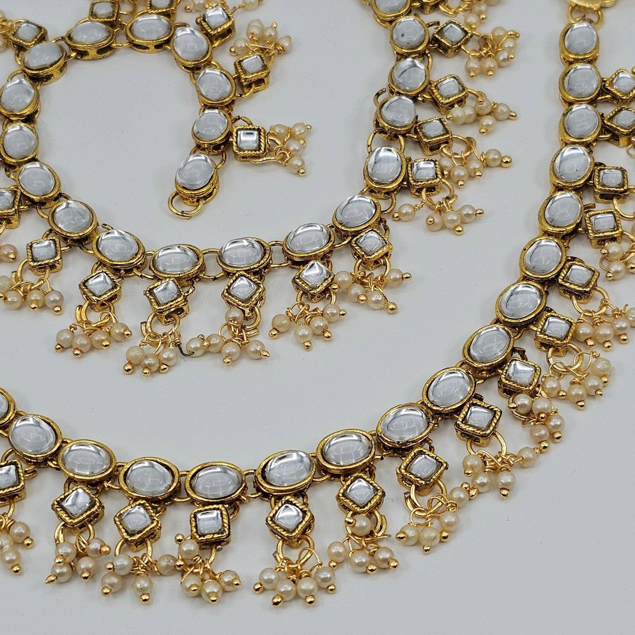 Neha Oval Shape Kundan Stone Pearl detailed Anklets - Fancy Fab Jewels