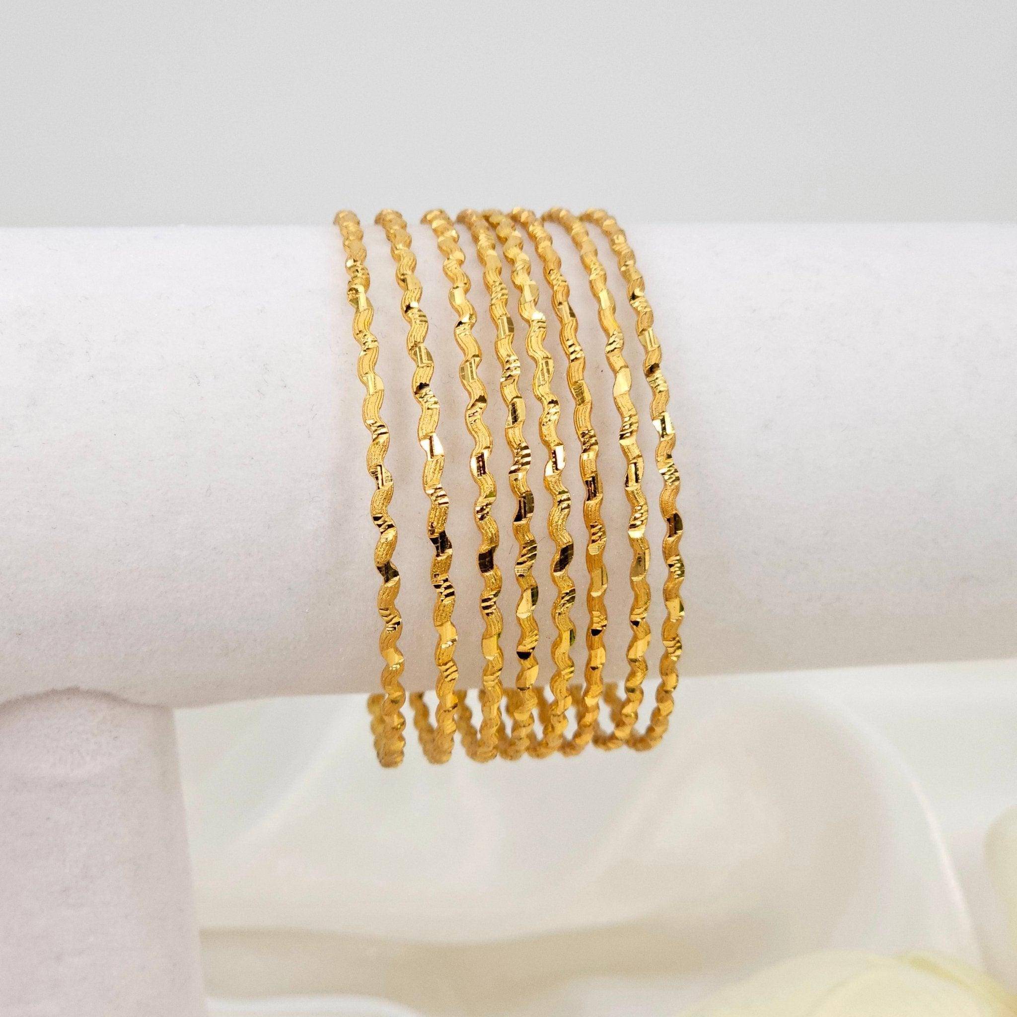 8 Pcs Slim Gold Plated Indian Bangles - Fancy Fab Jewels