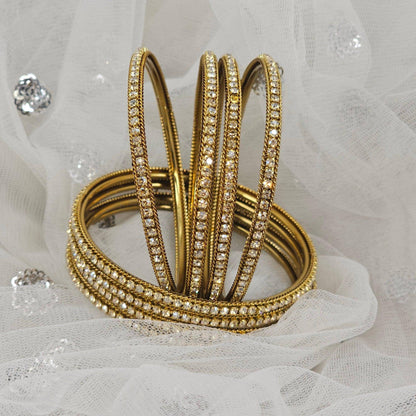 Sharmin- 8 Pcs Gold Plated  CZ Bangle Set - Fancy Fab Jewels