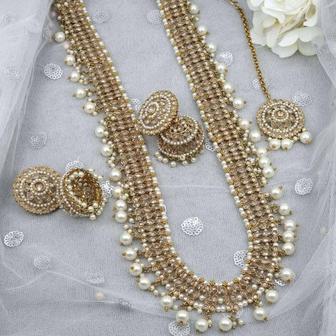 Sabiha- Antique Gold Polki Mala Necklace Set with Jhumki Earrings and Tikka - Fancy Fab Jewels