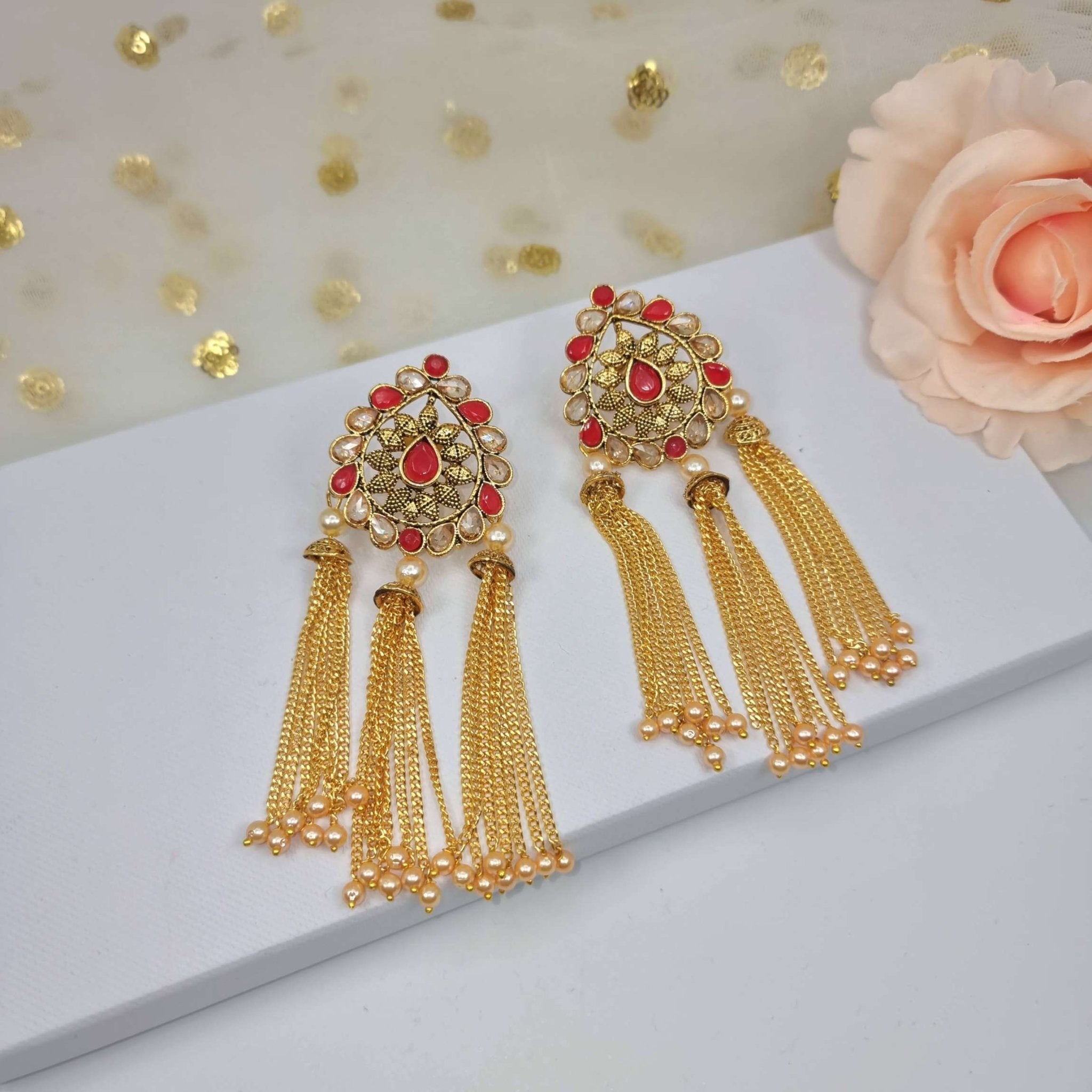 Luxurious Gold Tassel Earrings with red colors stone