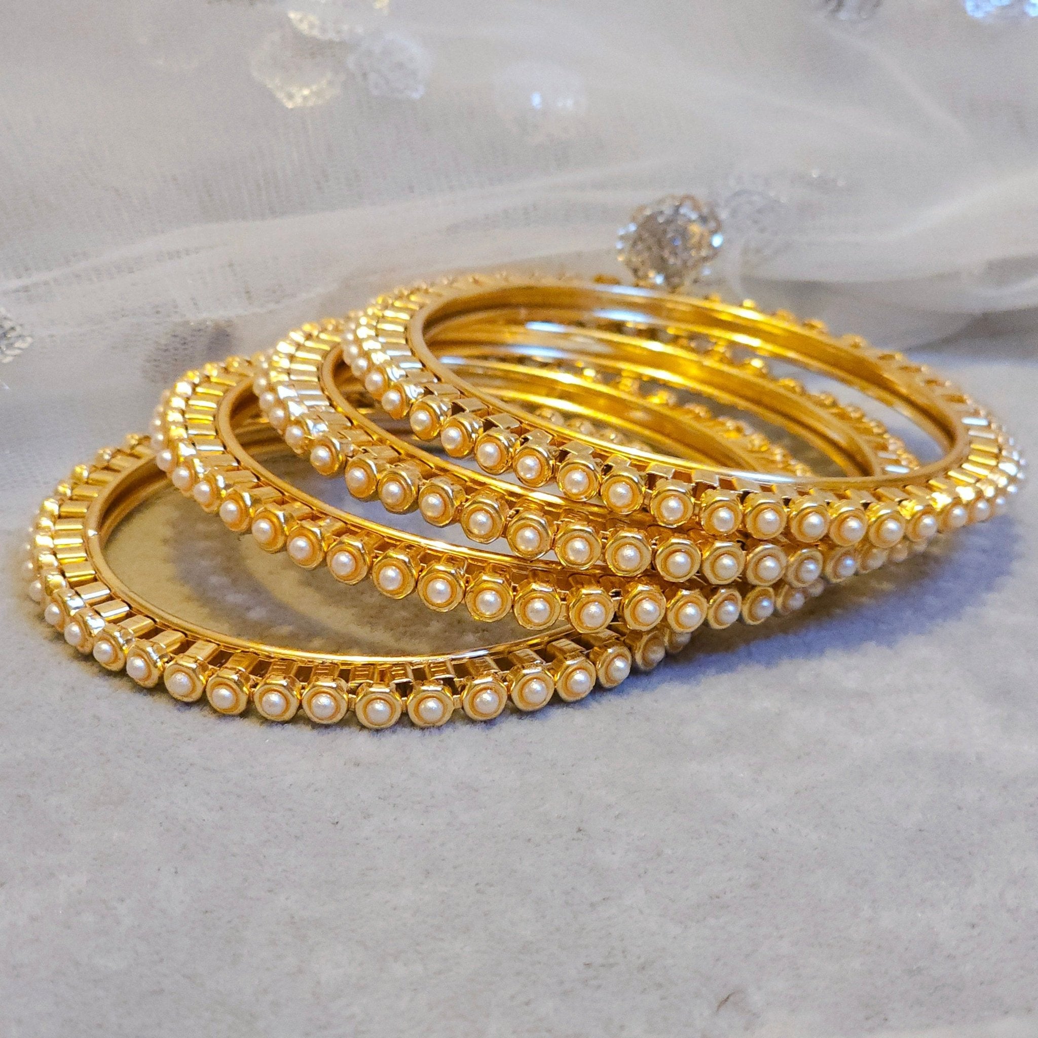 Set of 4 Elegant Pearl Bangles for a Touch of Class Perfect for Any Occasion - Fancy Fab Jewels